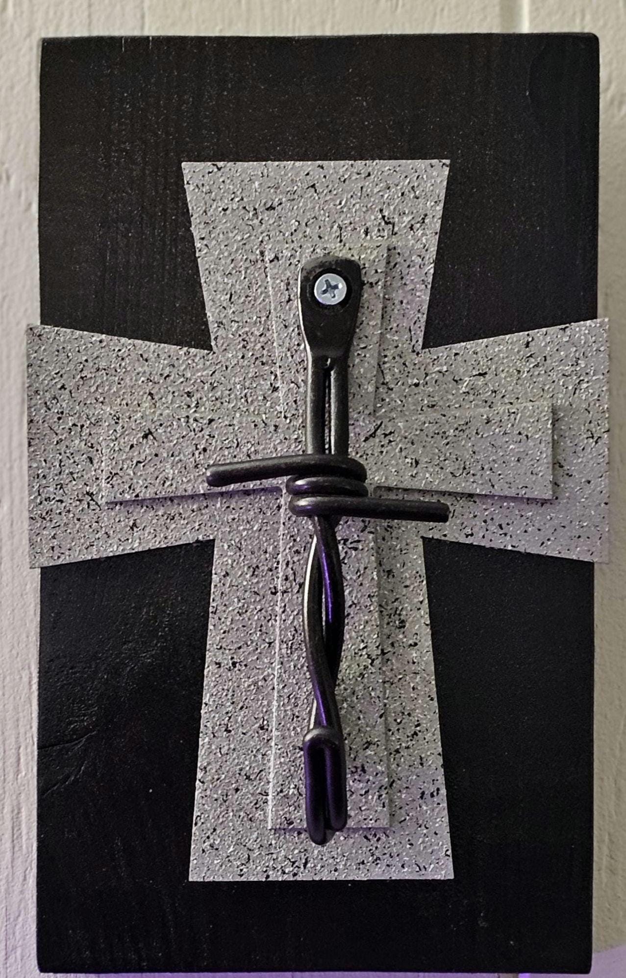 Brown and grey cross plant hanger