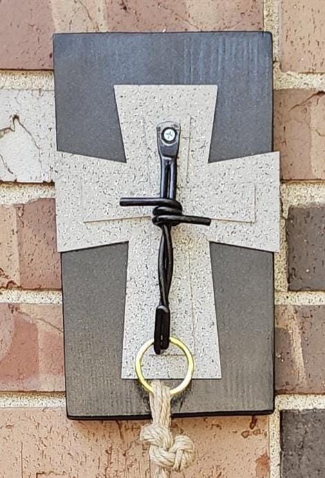 Brown and grey cross plant hanger